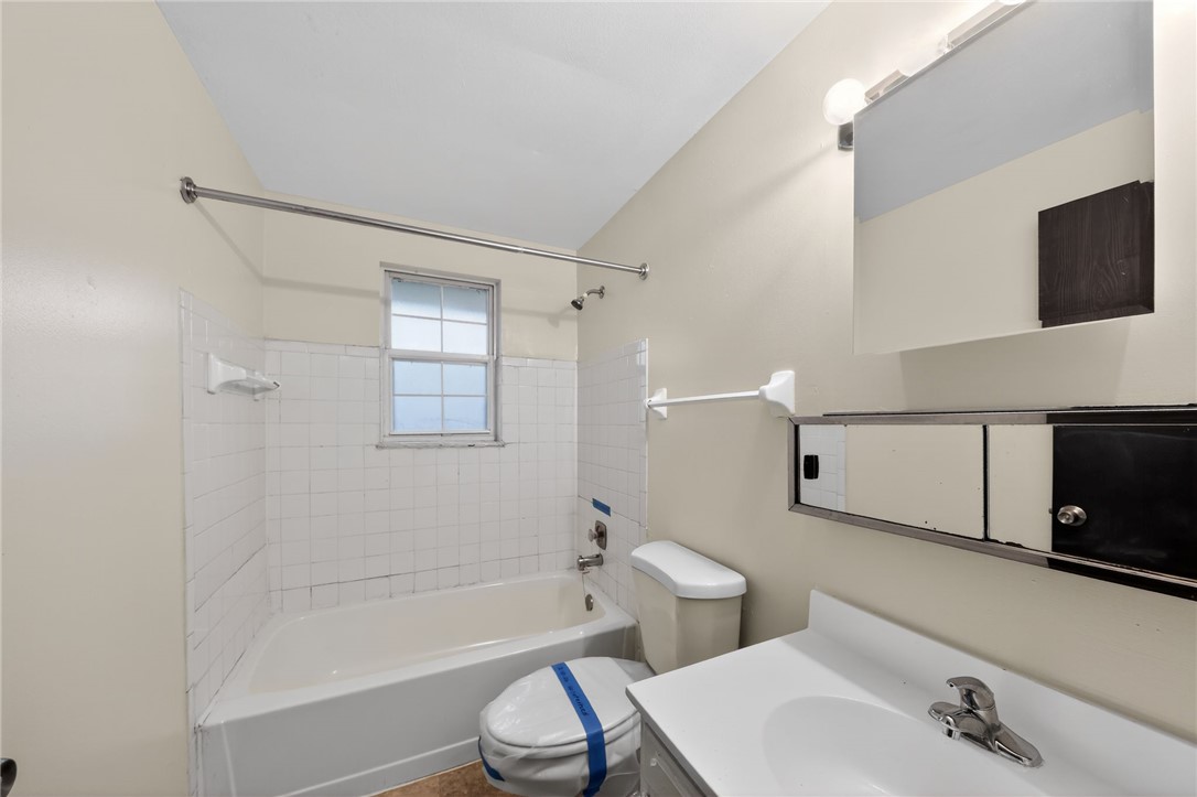 6070 Charlesgate Road Huber Heights, OH 45424 - Photo 21 of 29 This bathroom features a bathtub and a window, creating a refreshing atmosphere.