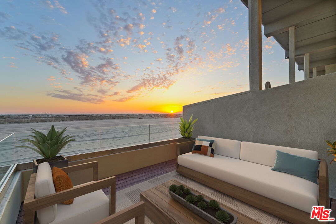 6 Voyage Street, Unit 108 Marina del Rey, CA 90292 - Photo 14 of 27 a roof deck with couch