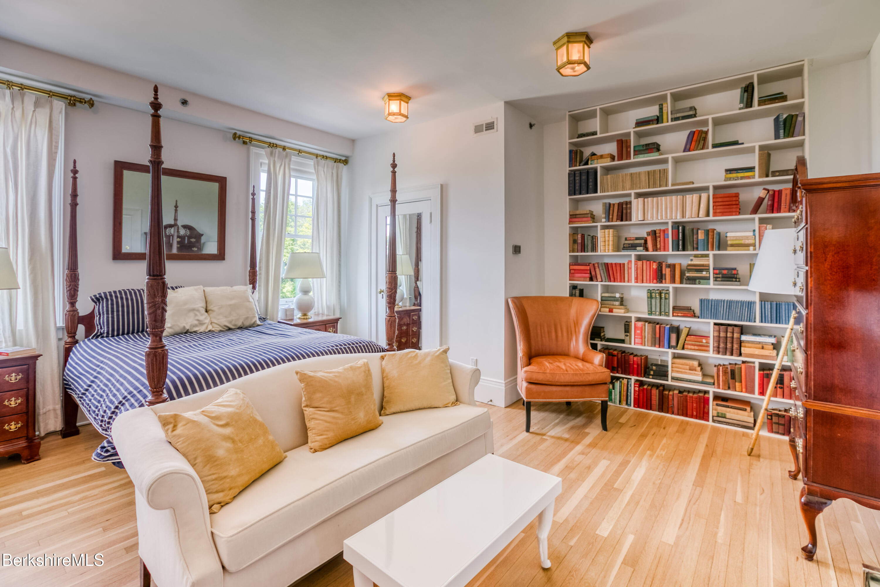 2 Kemble Street Lenox, MA 01240 - Photo 29 of 41 a living room with furniture and a book shelf