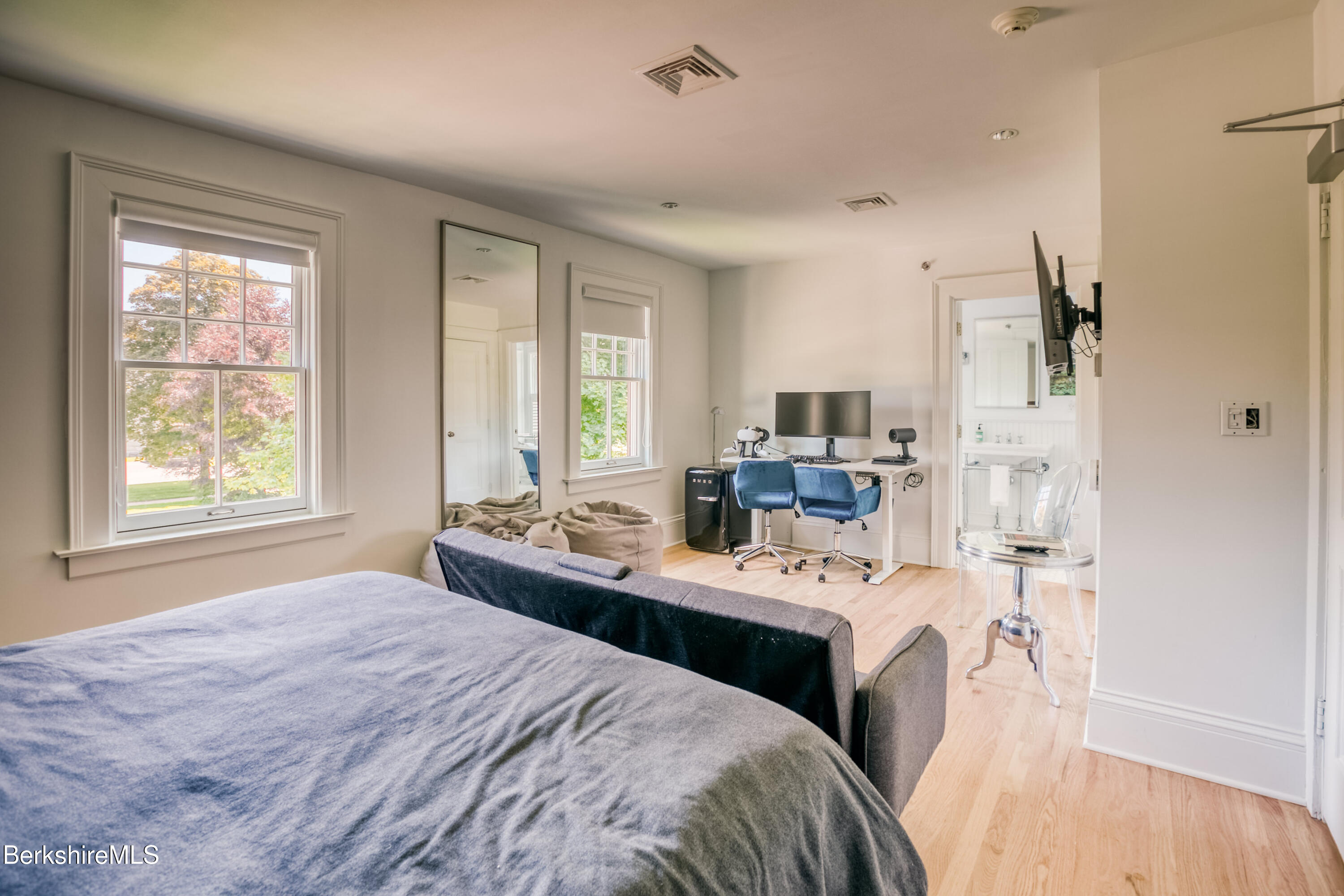 2 Kemble Street Lenox, MA 01240 - Photo 30 of 41 a bedroom with a bed a large window and sink