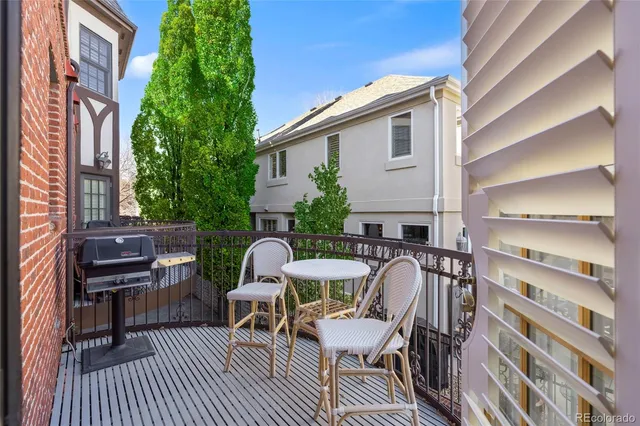 a bedroom with a bed and a fireplace