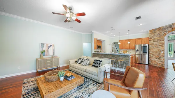 a living room with furniture and a rug