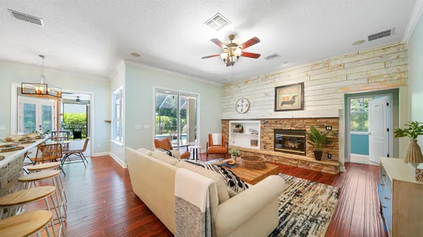 a bathroom with a sink a toilet and a view of bathroom