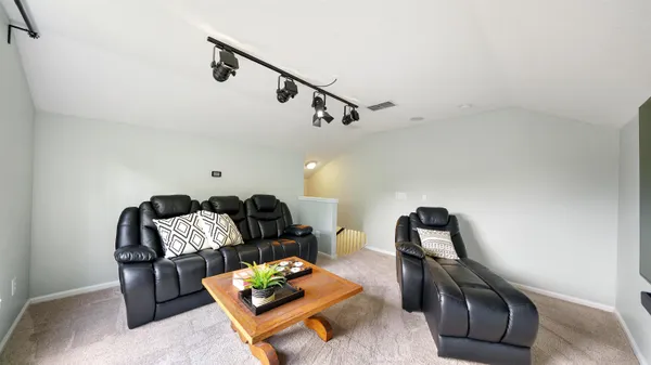 a view of swimming pool with outdoor seating