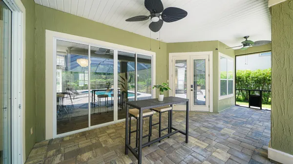 an aerial view of a houses with a yard