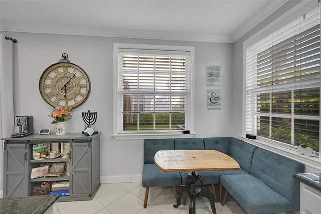 a view of a room with furniture window and wooden floor