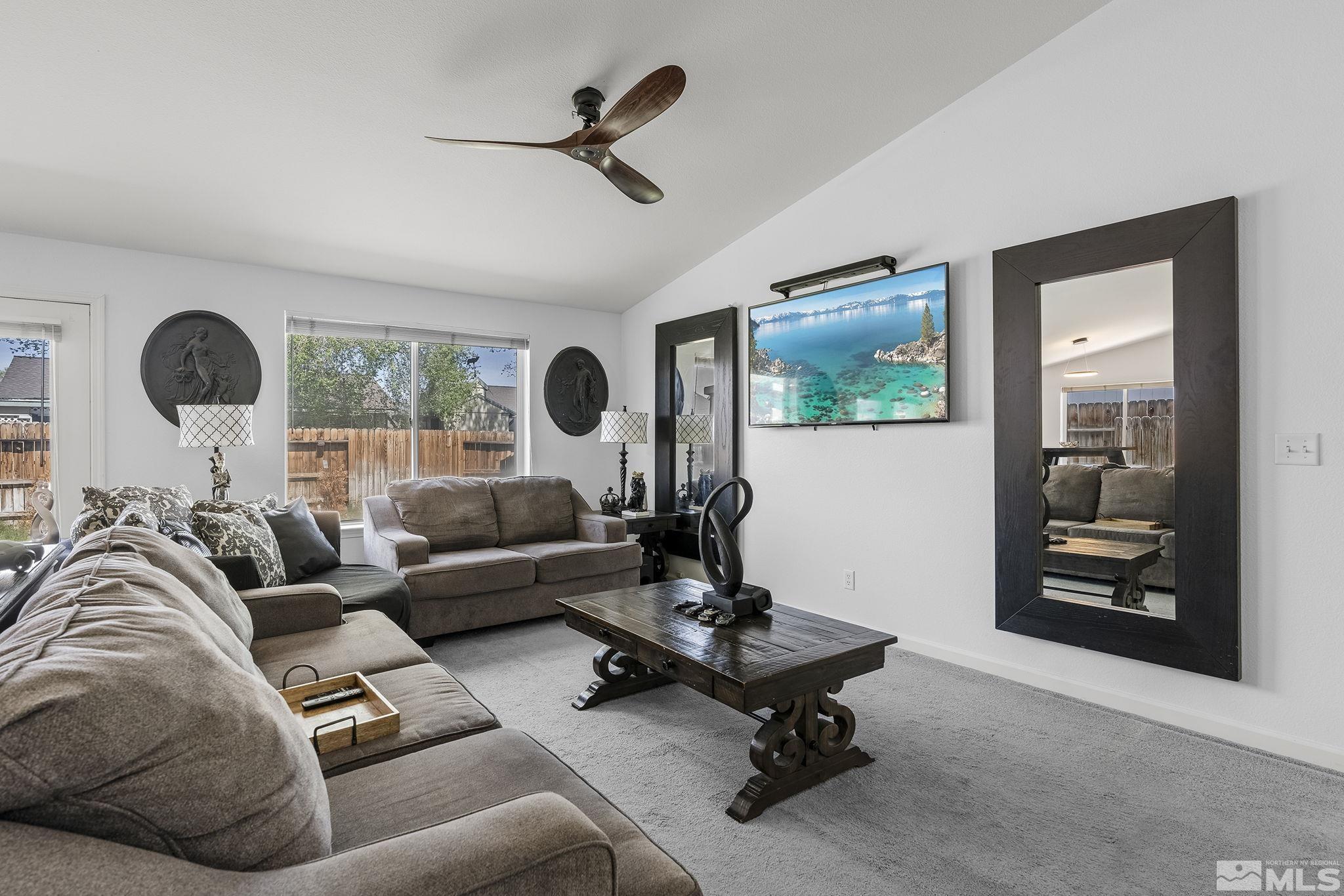 940 Atrium Road Fernley, NV 89408 - Photo 2 of 20 a living room with furniture and a window