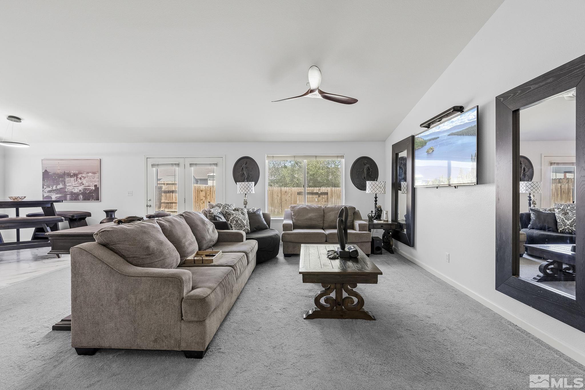 940 Atrium Road Fernley, NV 89408 - Photo 4 of 20 a living room with furniture and a large window