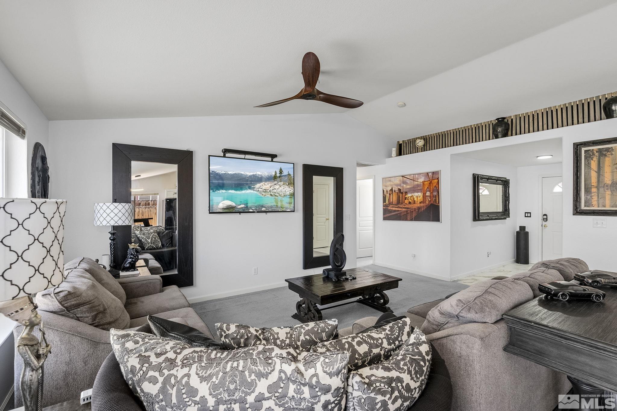940 Atrium Road Fernley, NV 89408 - Photo 5 of 20 a living room with furniture and a flat screen tv