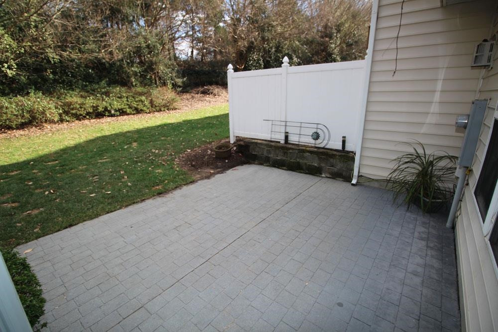 6952 Middleboro Drive Raleigh, NC 27612 - Photo 26 of 32 Enjoy peaceful, private patio, backing up to HOA green space. Patio