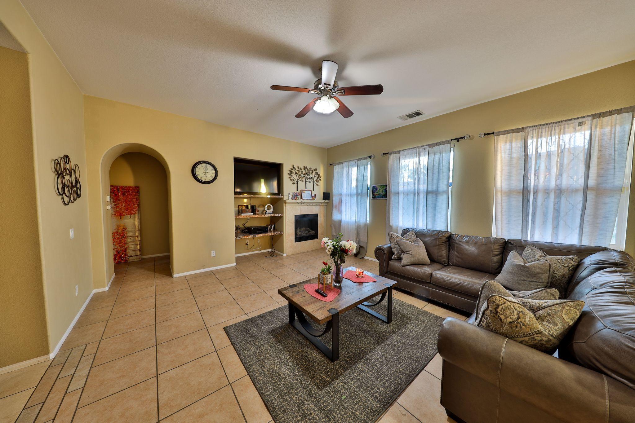 82834 Randsburg Lane Indio, CA 92203 - Photo 7 of 18 a living room with furniture and wooden floor