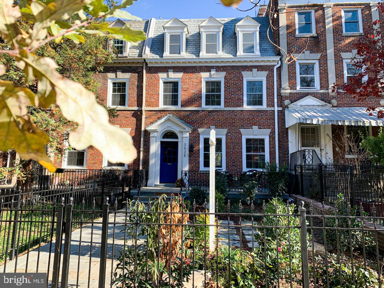 Front view of the house (fenced in)