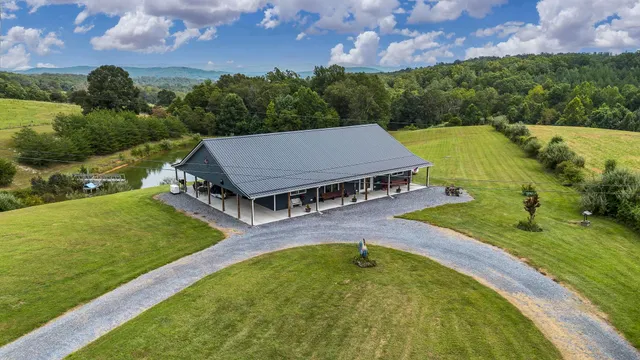 an aerial view of a house with a garden