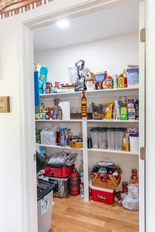 a living room with fireplace furniture and a flat screen tv