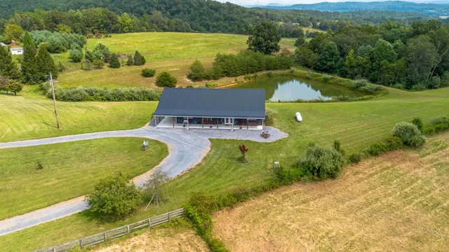 an aerial view of a house with a garden
