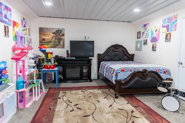 a room with furniture and a window