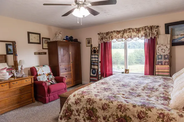 a front view of house with yard and entertaining space