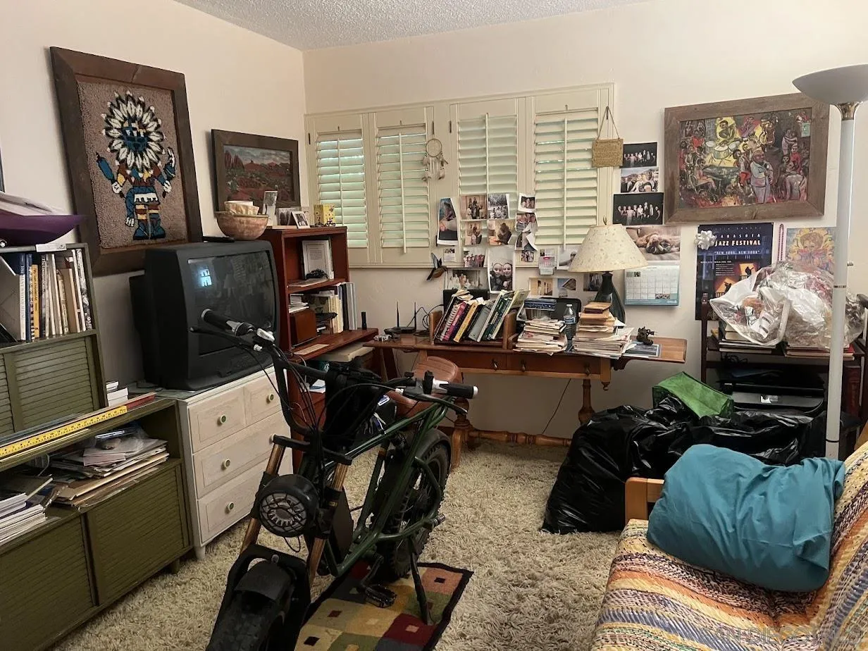 2630 Torrey Pines Road, Unit E21 La Jolla, CA 92037 - Photo 4 of 24 a view of a workspace with furniture and a window