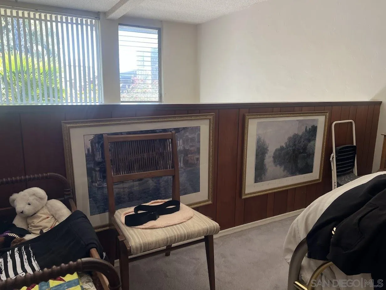 2630 Torrey Pines Road, Unit E21 La Jolla, CA 92037 - Photo 10 of 24 a living room with furniture and window