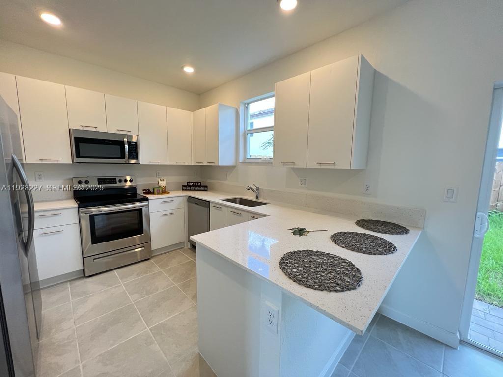 12612 Northwest 23rd Place Miami, FL 33167 - Photo 3 of 27