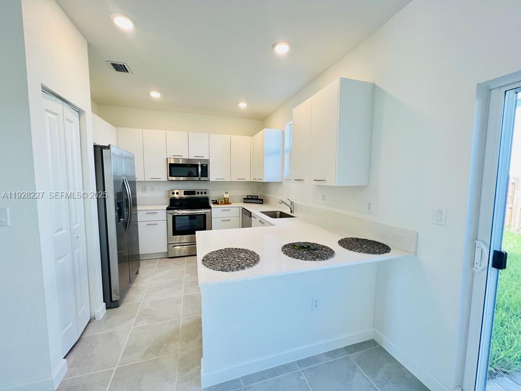 12612 Northwest 23rd Place Miami, FL 33167 - Photo 6 of 27