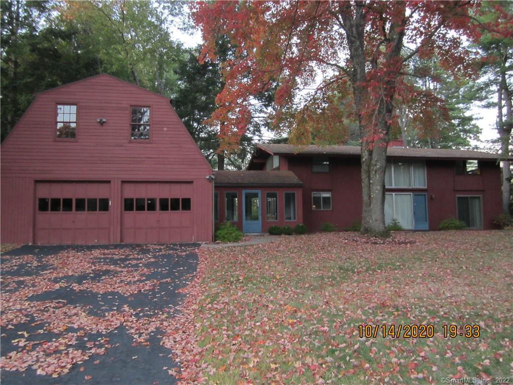 18 Haynes Road Avon, CT 06001 - Photo 1 of 1 a house with trees in front of it