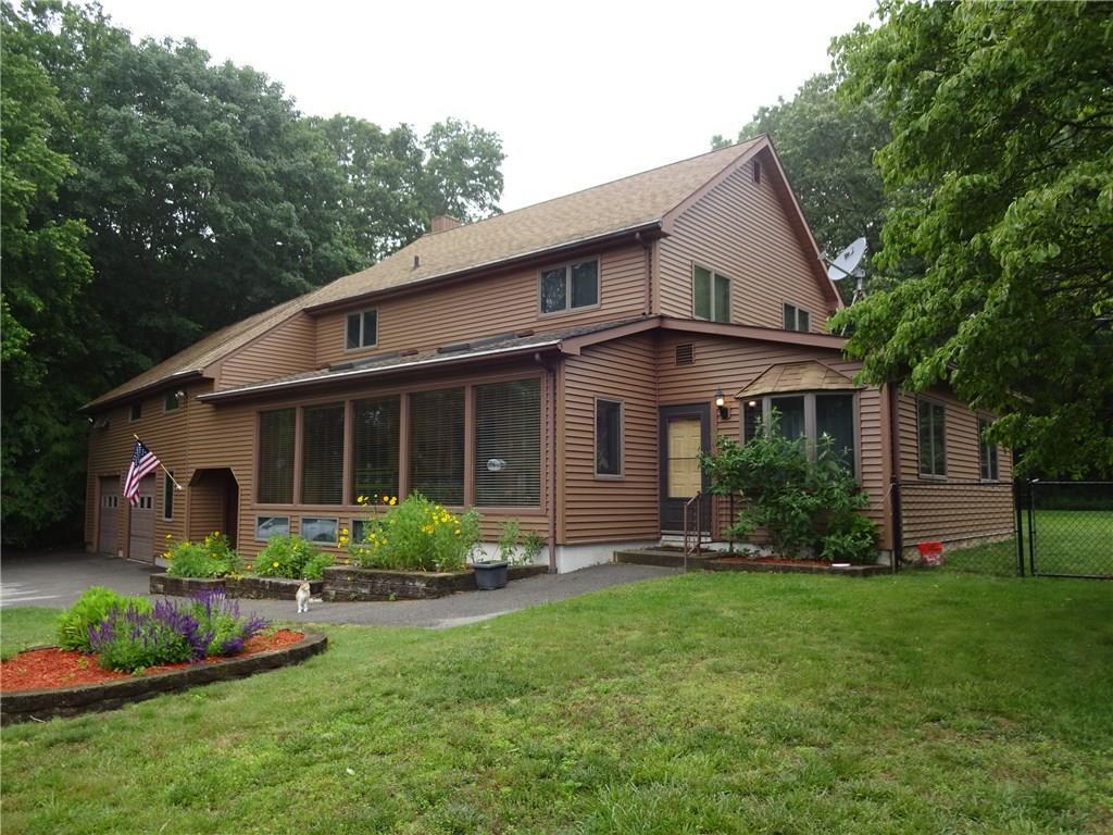 2 Fargo Drive Ledyard, CT 06339 - Photo 1 of 1 a view of a house with backyard and garden
