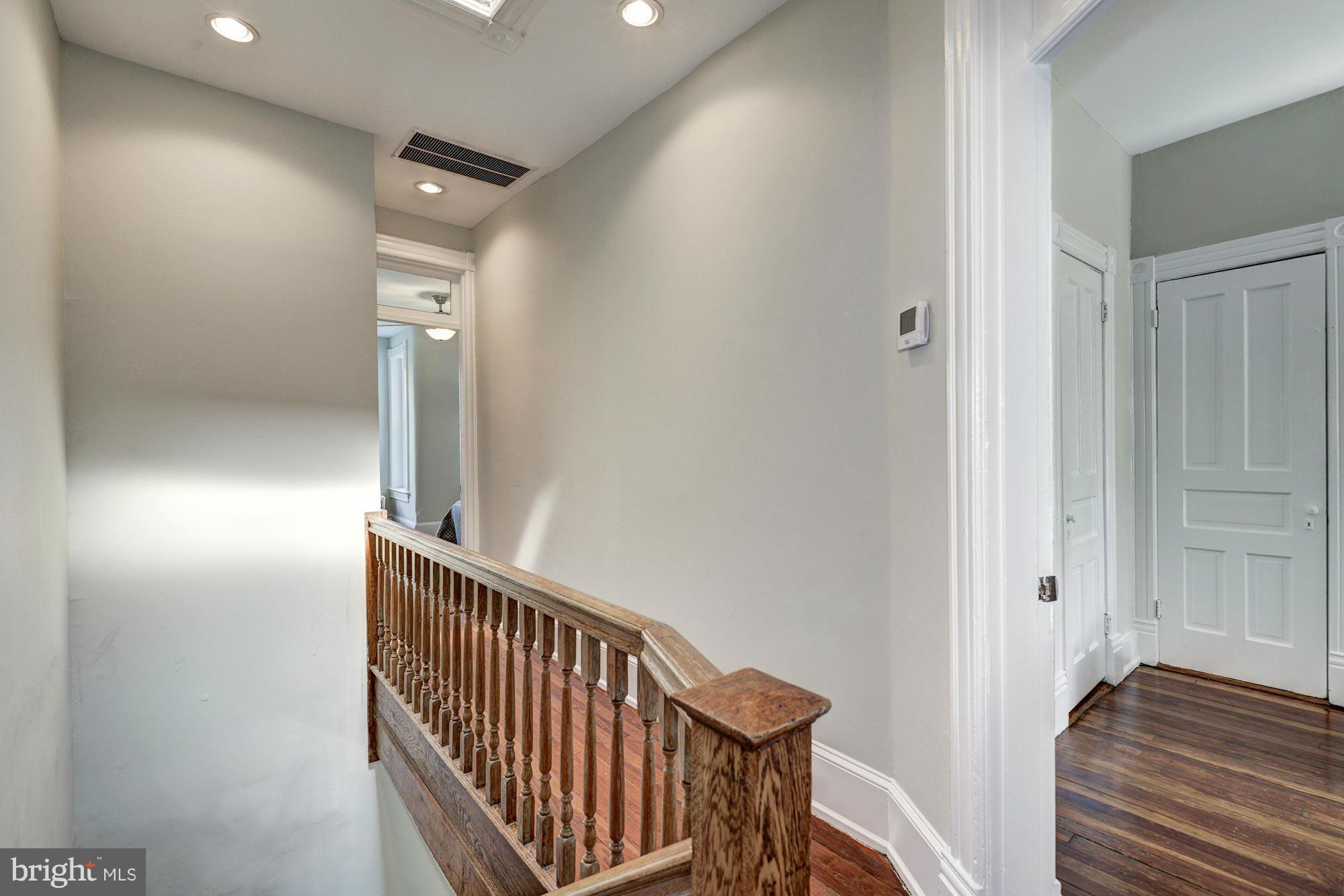 146 U Street Northwest Washington, DC 20001 - Photo 15 of 30 Upstairs hall w/ original skylight and transoms