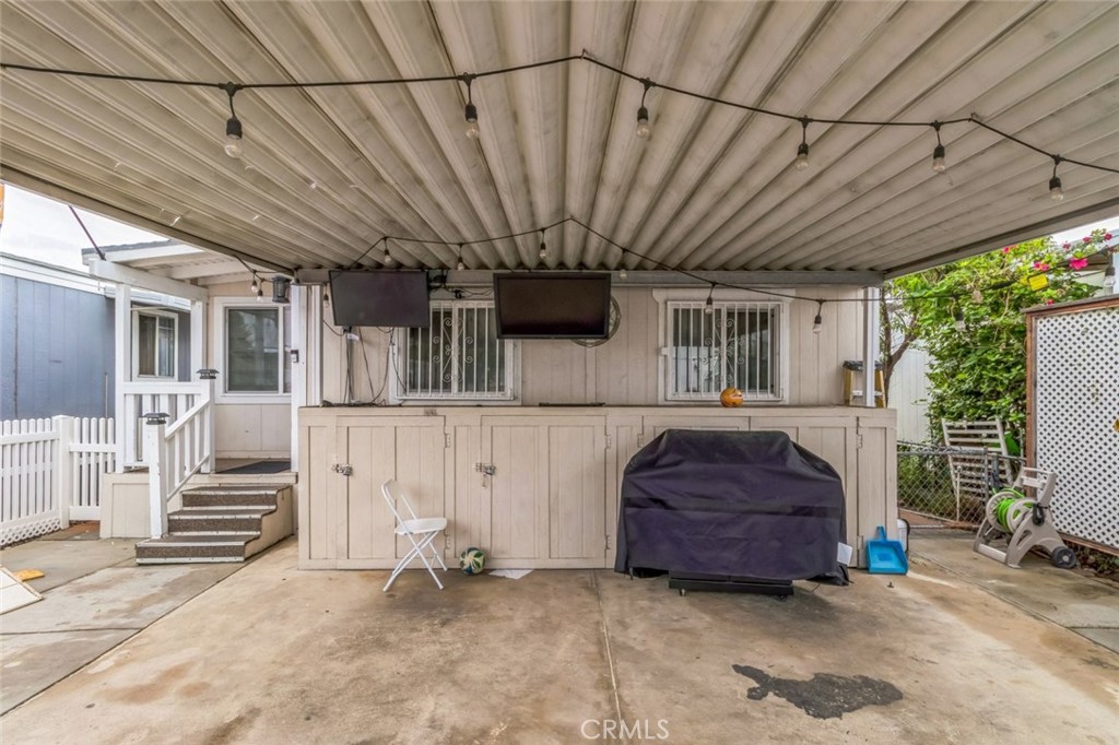 8221 Ilex Street, Unit 10 Rancho Cucamonga, CA 92335 - Photo 7 of 27 a house view with a outdoor space