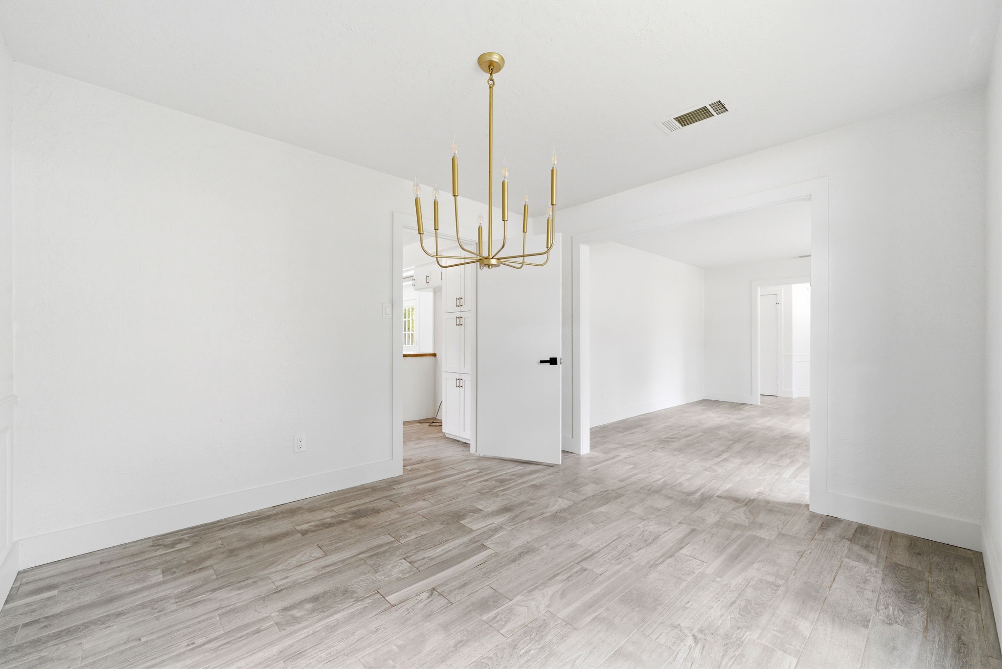 8131 Theisswood Road Spring, TX 77379 - Photo 7 of 31 Formal dining room with beautiful light fixture
