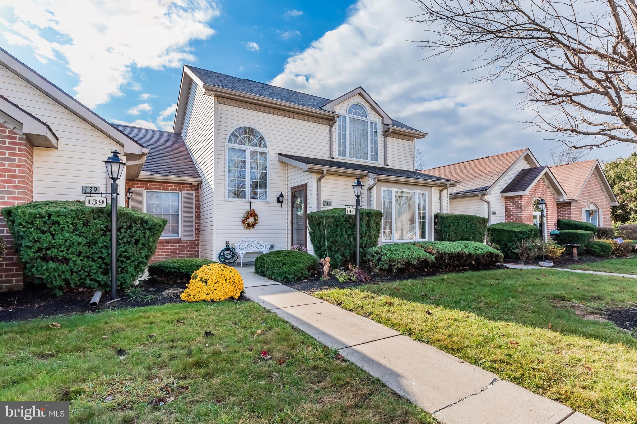 141 Strayer Drive Carlisle, PA 17013 - Photo 1 of 27 a front view of a house with garden