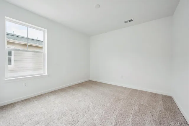 an empty room with a window
