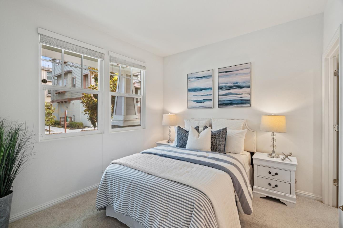 3410 Pyramid Way Mountain View, CA 94043 - Photo 20 of 55 a bedroom with a bed and a window