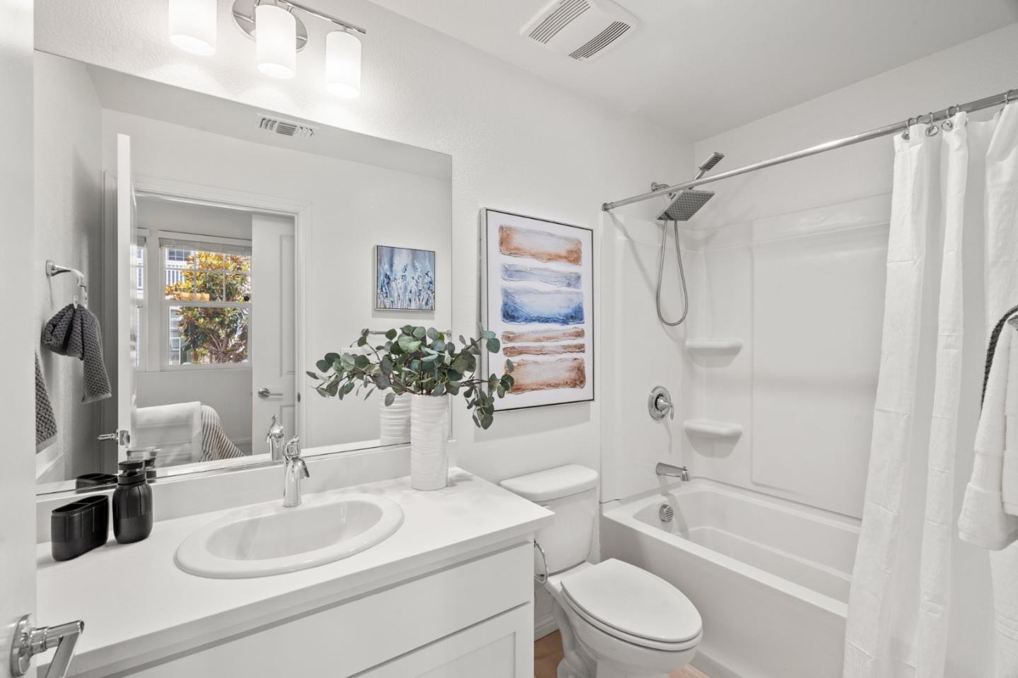 3410 Pyramid Way Mountain View, CA 94043 - Photo 24 of 55 a bathroom with a sink toilet tub and shower