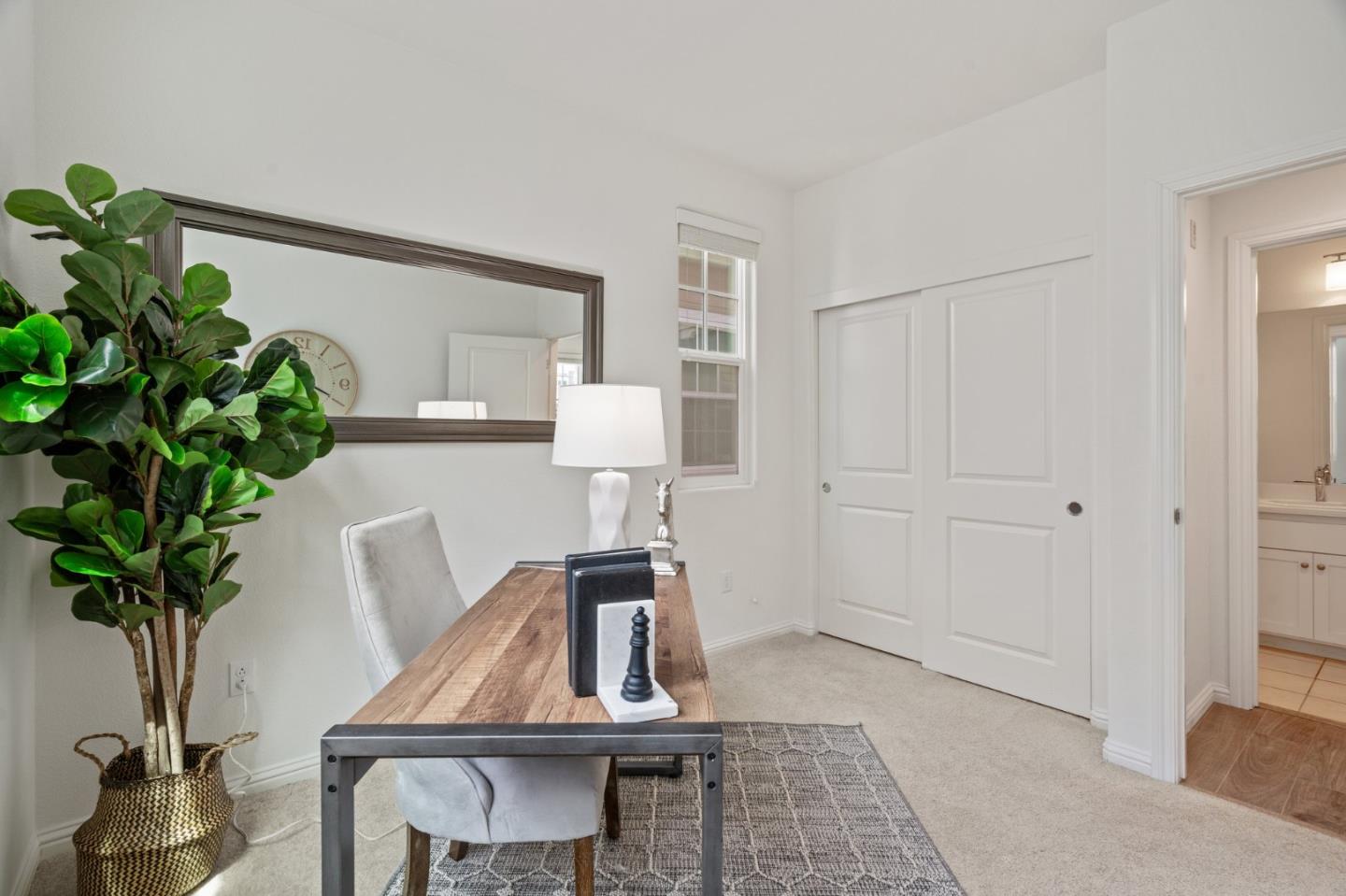 3410 Pyramid Way Mountain View, CA 94043 - Photo 25 of 55 a living room with furniture and a potted plant