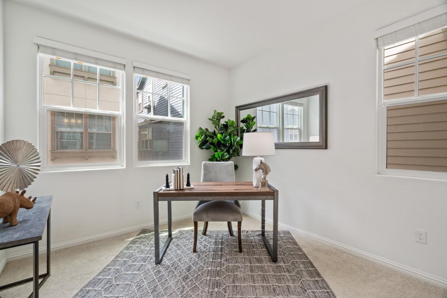 3410 Pyramid Way Mountain View, CA 94043 - Photo 26 of 55 a view of a workspace with furniture and a window