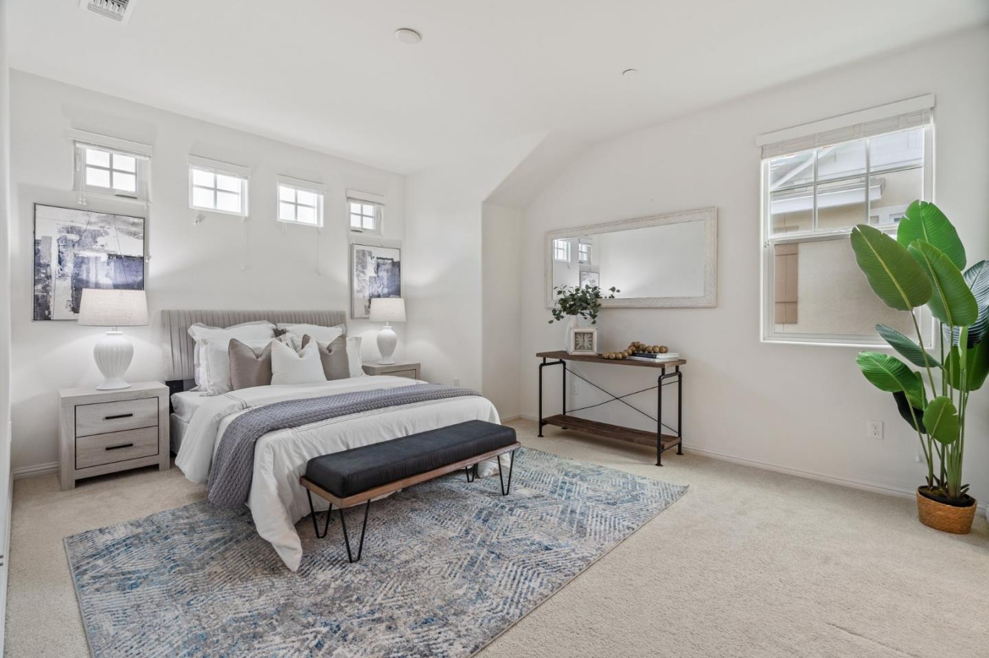 3410 Pyramid Way Mountain View, CA 94043 - Photo 29 of 55 a bedroom with a bed and a potted plant