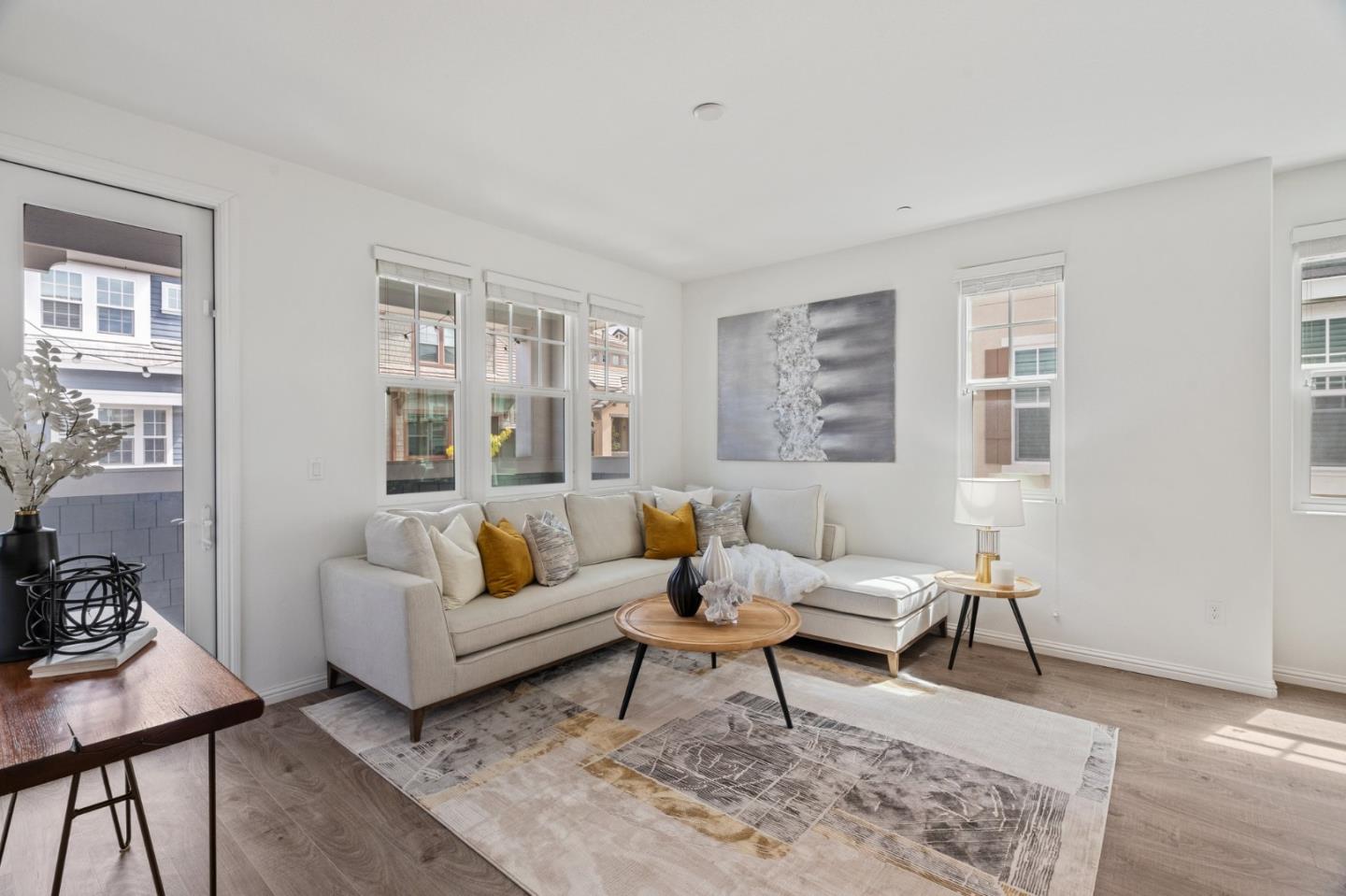 3410 Pyramid Way Mountain View, CA 94043 - Photo 3 of 55 a living room with furniture and a potted plant