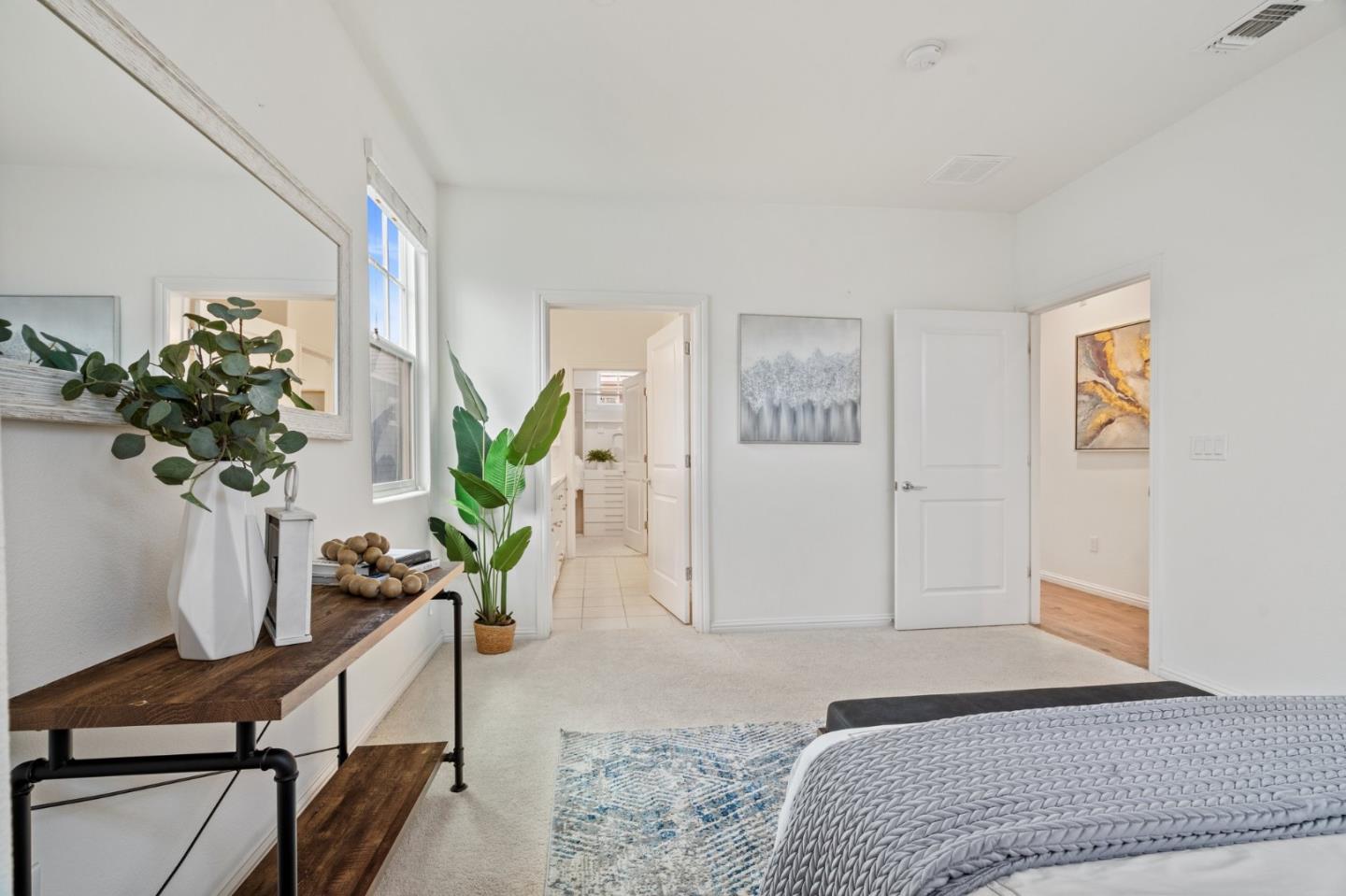 3410 Pyramid Way Mountain View, CA 94043 - Photo 31 of 55 a bedroom with furniture and a potted plant