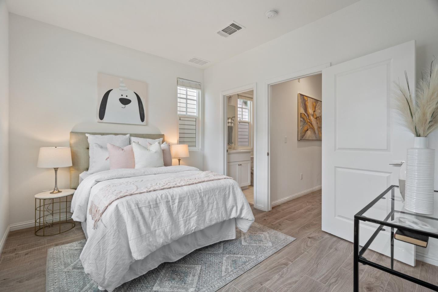 3410 Pyramid Way Mountain View, CA 94043 - Photo 38 of 55 a bedroom with a bed and wooden floor