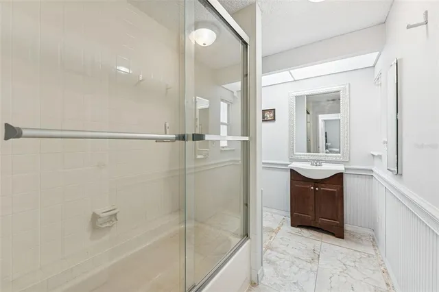 a bathroom with a bathtub and a sink