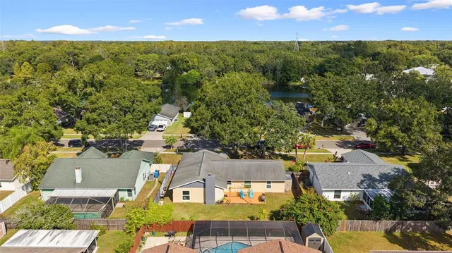 an aerial view of a house with a garden