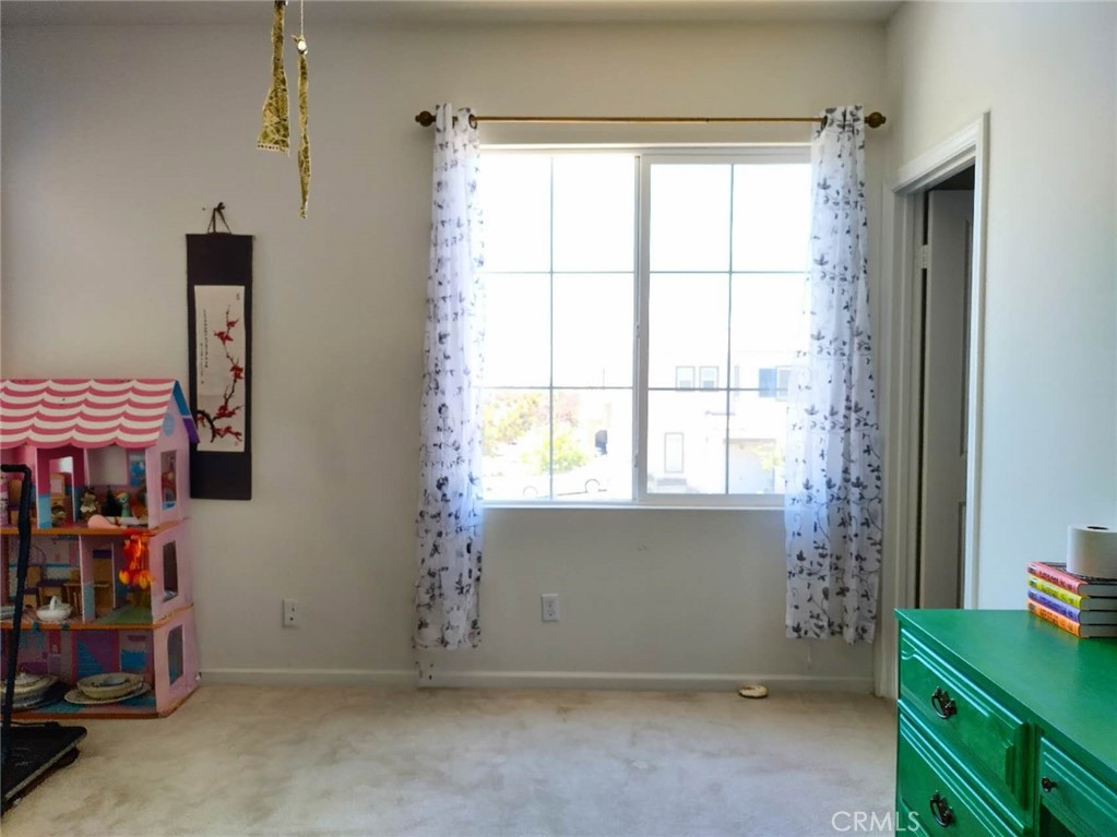 11811 Cramer Road Yucaipa, CA 92399 - Photo 41 of 56 a view of room with window and storage