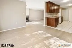 a view of livingroom with kitchen