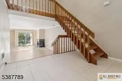 a view of an entryway with staircase