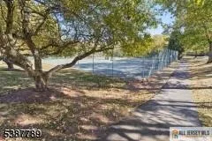 a view of backyard with green space