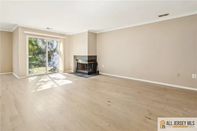a view of livingroom with furniture and window