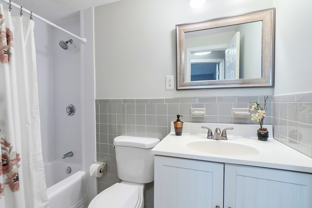 84 Renwick Road, Unit C Wakefield, MA 01880 - Photo 17 of 29 a bathroom with a sink toilet and shower