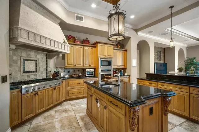 a kitchen with a large window in it