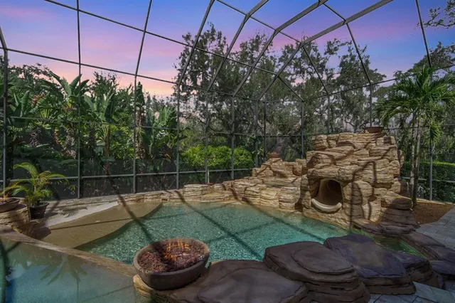 a view of a house with swimming pool